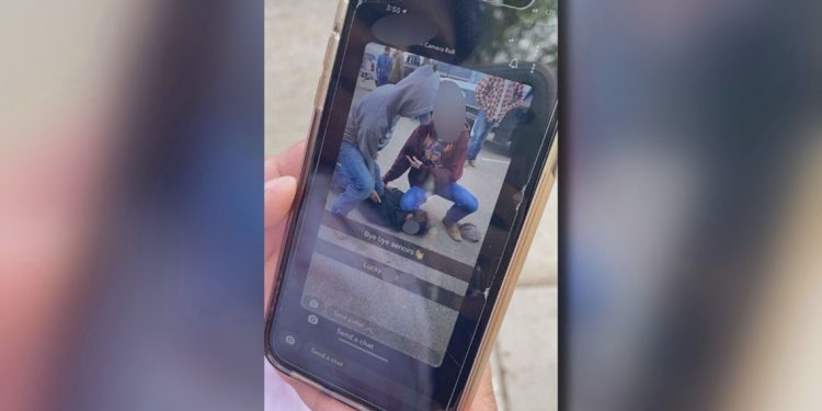 social-media-post-appears-to-show-3-people-recreating-the-death-of-george-floyd-on-mead-high-…