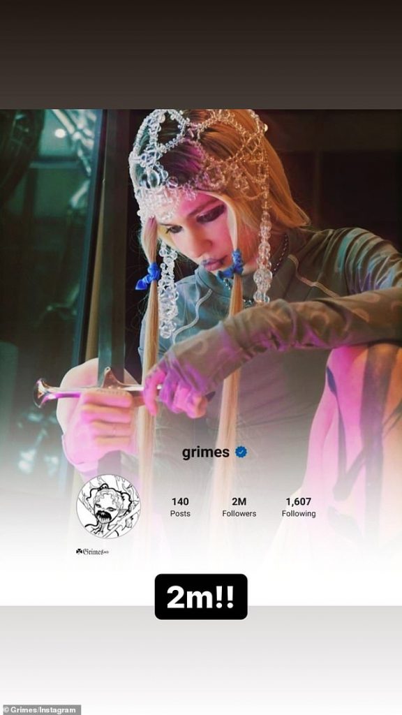 grimes-celebrates-2-million-instagram-followers-by-sharing-a-behind-the-scenes-snap-from-alter-…