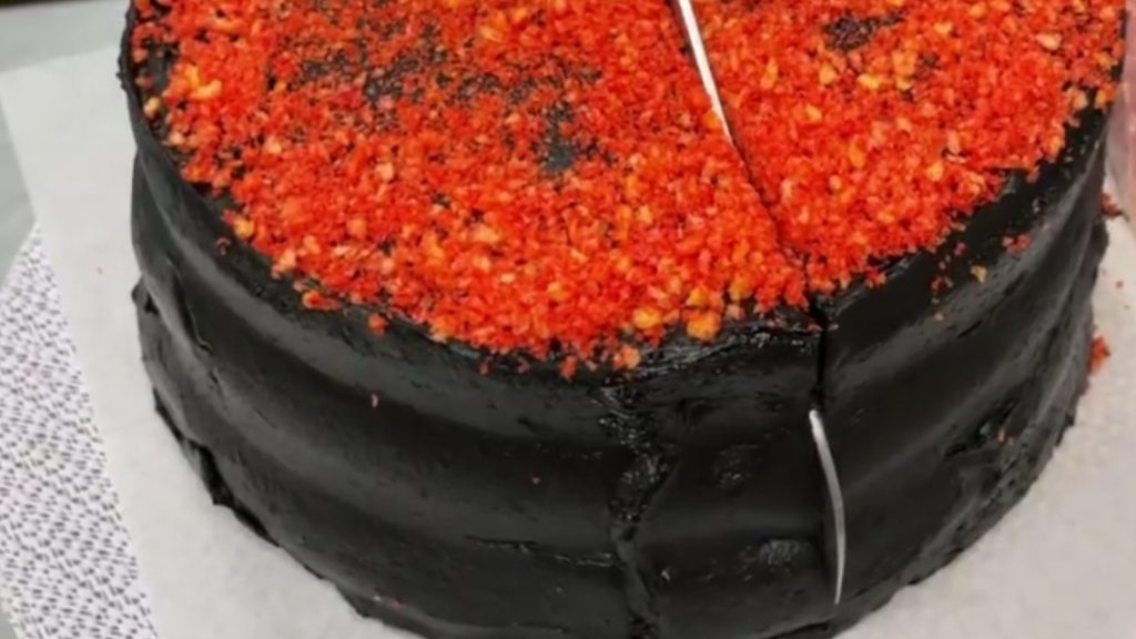 this-dessert-shop-is-turning-heads-on-instagram-with-a-flamin'-hot-cheetos-cake-–-mashed
