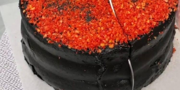this-dessert-shop-is-turning-heads-on-instagram-with-a-flamin'-hot-cheetos-cake-–-mashed