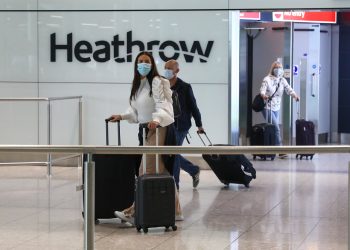 boeing,-airline-stocks-tumble-as-new-covid-variant-spurs-travel-curbs-–-cnbc