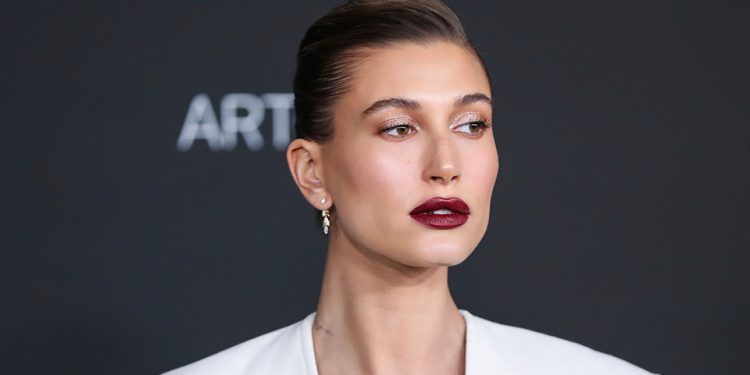 hailey-bieber's-string-bikini-&-body-chain-combo-is-a-look-i'm-stealing-this-summer-–-stylecaster
