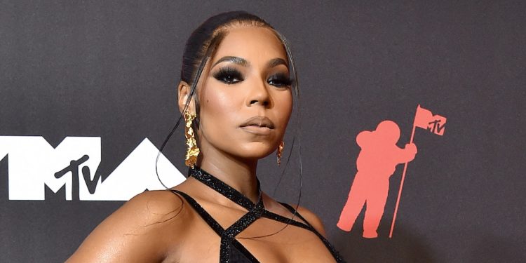 ashanti-sparkles-in-iridescent-sequin-catsuit-paired-with-pvc-heels-on-instagram-–-footwear-news