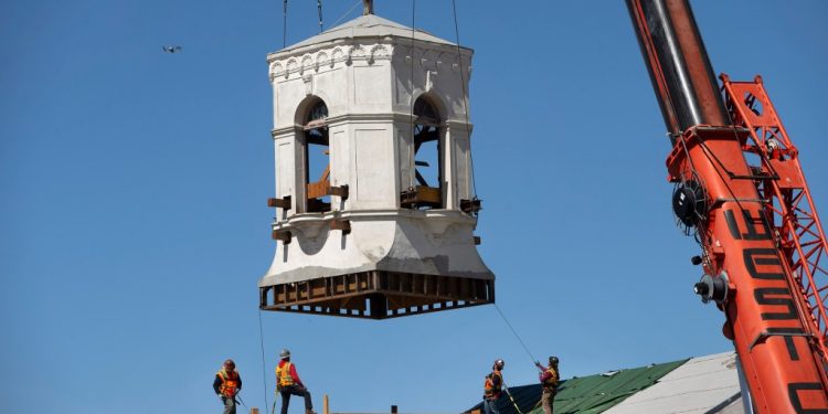 bell-tower-reattached-to-historic-clubhouse-as-oak-knoll-development-reaches-another-milestone