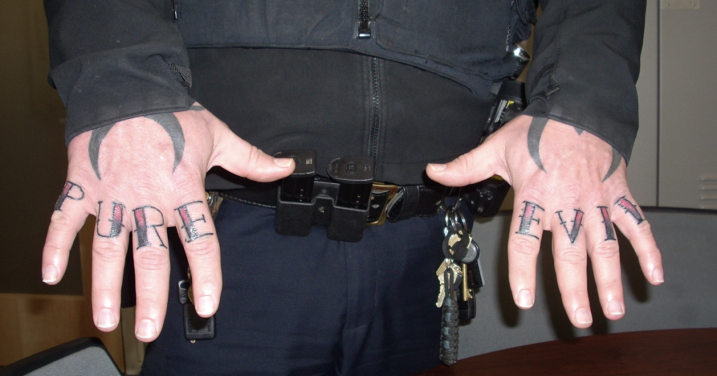 cincinnati-police-officer-fired-for-getting-'pure-evil'-tattooed-on-his-knuckles-–-wcpo