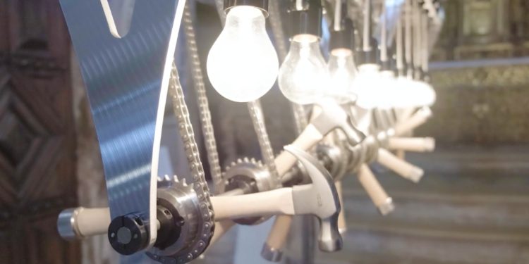 a-kinetic-sculpture-with-light-bulbs-and-hammers-in-motion-–-twistedsifter