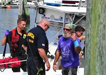 video-report:-man-brought-to-shore-and-taken-to-hospital-after-large-fish-hook-embeds-in-his-arm