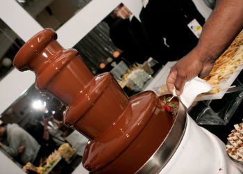 guy-attempts-to-lick-a-chocolate-fountain-and-pays-the-price-–-rock-92.9