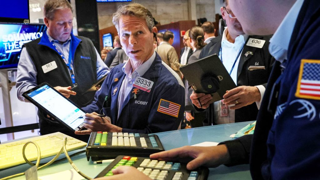 stock-futures-are-flat-as-investors-await-wednesday's-federal-reserve-rate-hike-decision