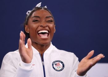 “thinks-i'm-a-jungle-gym”:-simone-biles-shares-adorable-video-with-her-family