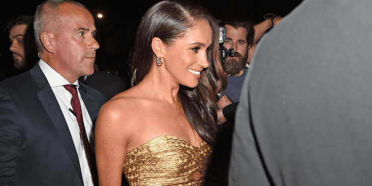 meghan-markle's-gold-red-carpet-dress-has-a-bold-hidden-meaning-|-stylecaster