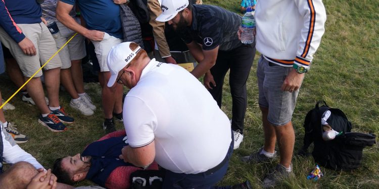 errant-jon-rahm-shot-strikes-spectator-and-costs-him-bogey-at-12th-hole-|-livescore