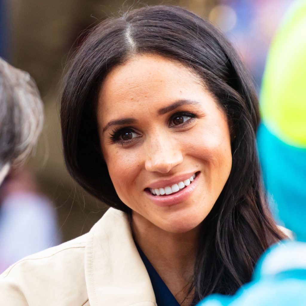 meghan-markle-rocks-chic-sleeveless-turtleneck-top-and-matching-skirt-in-first-major-…
