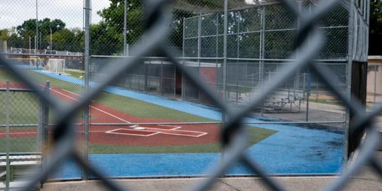 offensive-social-media-posts-lead-father-judge-to-reopen-search-for-baseball-coach