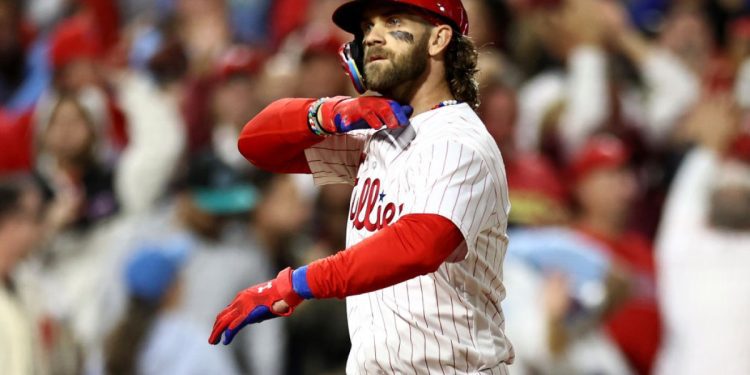 mlb-playoffs:-bryce-harper-answers-orlando-arcia-with-his-bat-as-phillies-crush-braves