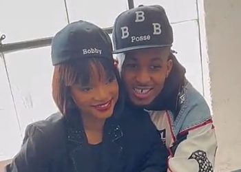 halle-bailey-hides-stomach-behind-jacket-for-whitney-houston-costume-with-boyfriend-ddg-…